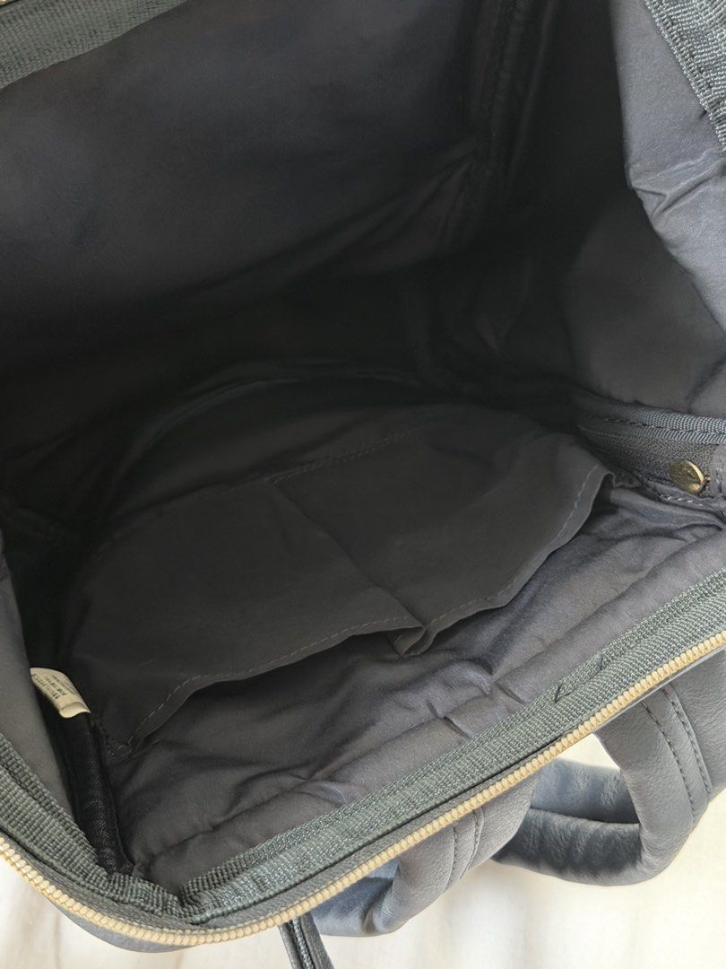 Anello Leather-Style Navy Blue Backpack (Category: Backpacks) located in Pasig City. Submitted by xojem (Listing ID 1468819298, Image 3). Description: Slight wear on the front brand patch, otherwise fully functional.