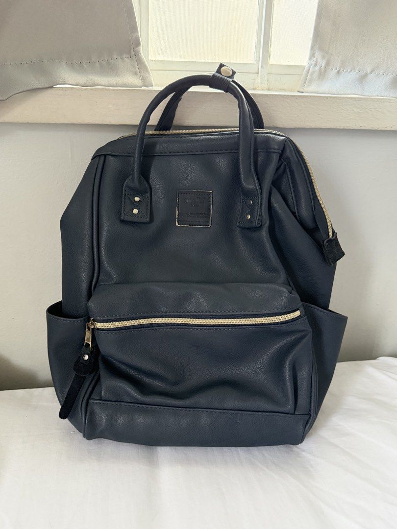 Anello Leather-Style Navy Blue Backpack (Category: Backpacks) located in Pasig City. Submitted by xojem (Listing ID 1468819298, Image 1). Description: Slight wear on the front brand patch, otherwise fully functional.