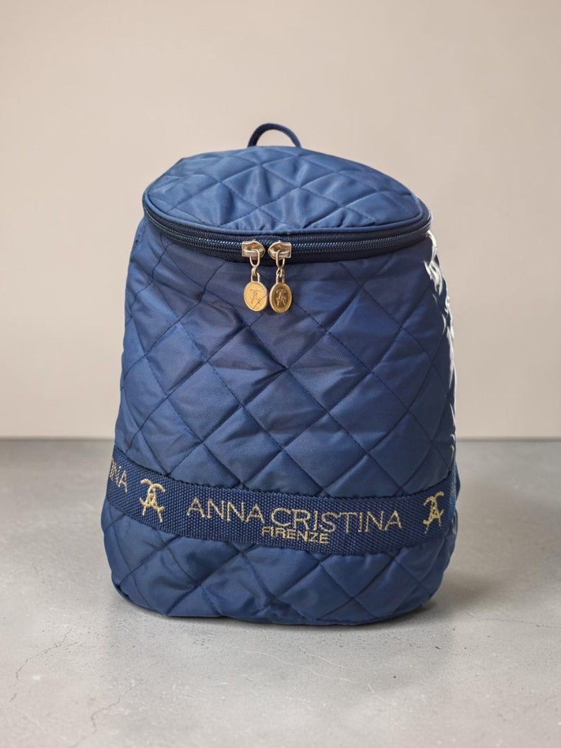 ANNA CRISTINA FIRENZE QUILTED NYLON BACKPACK (Category: Backpacks) located in Las Pinas. Submitted by annachiaonair2037 (Listing ID 1468760634, Image 2). Description: ANNA CRISTINA FIRENZE QUILTED NYLON BACKPACK FROM JAPAN INNER MONOGRAM LEATHER LINING FADE HARDWARE ONLY H 13" L 11" W 5.5" Disclaimer: I am not affiliated with, associated with, or authorized by any of the brands featured posted. Any mention of brand names, trademarks, or logos is 