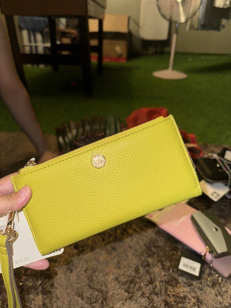Anne Klein slim zip wallet green (Category: Wallets & Card Holders) located in Pasig City. Submitted by thesipsnapofficial (Listing ID 1468836107, Image 1). Description: .