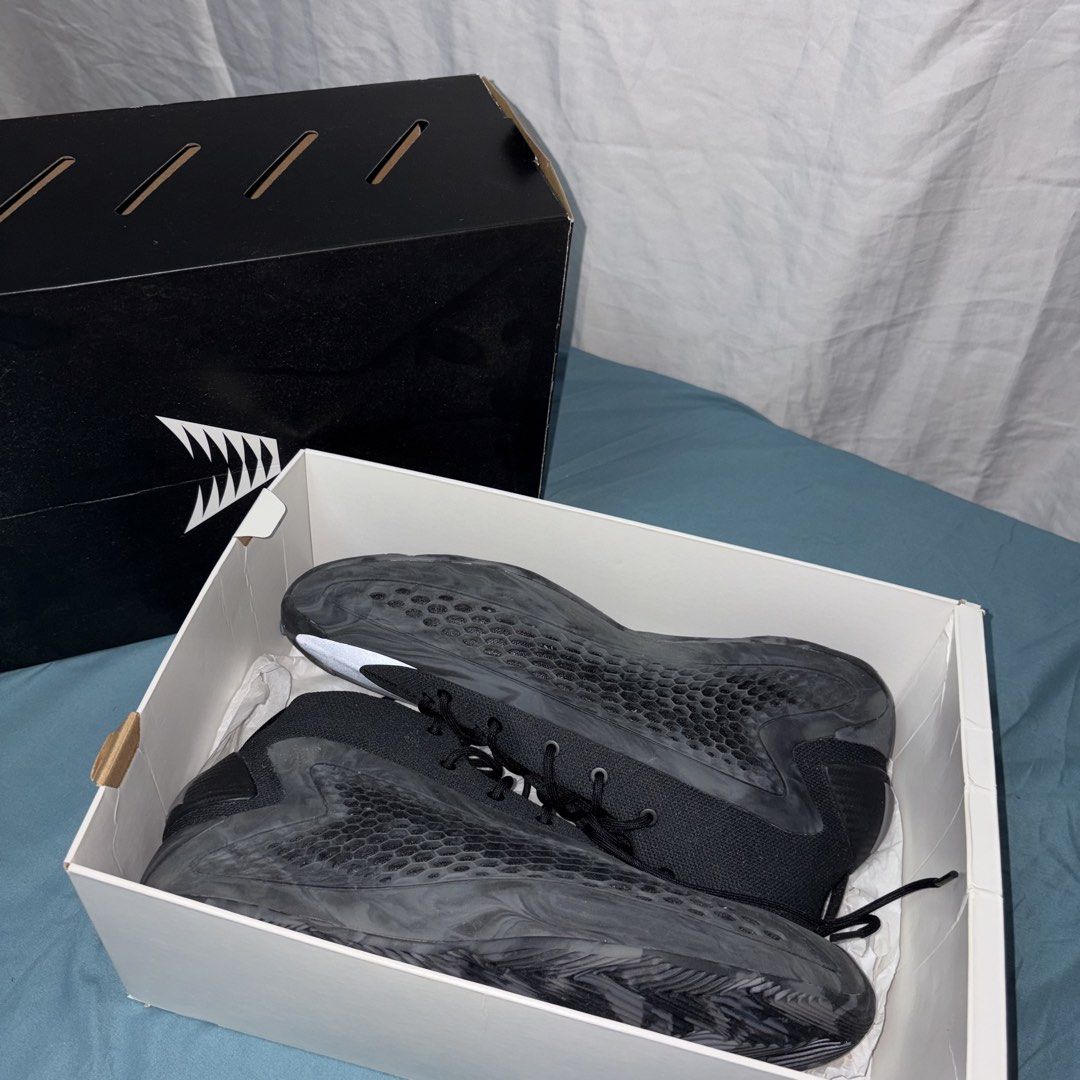 Anthony Edwwards 1 Basketball Shoes (Category: Sneakers) located in Cavite. Submitted by mattheo2 (Listing ID 1468771285, Image 1). Description: - Colorway: Black with white toe box detail - Design: High-top mesh upper with textured synthetic midsole overlays - Performance: Standard lace-up closure and high-traction outsole - Inclusion: Original black and white box included - Condition: Excellent / Brand New(ready to ship).