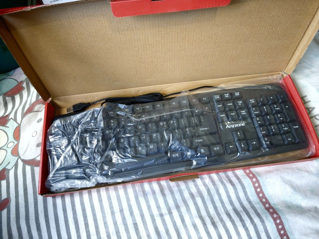 Anyzone ANY-K2 Wired Membrane USB Keyboard (Category: Computer Keyboard) located in Manila. Submitted by juvy.alpha (Listing ID 1468929273, Image 2). Description: - Brand: Anyzone - Model: ANY-K2 wired membrane USB keyboard - Layout: Standard 104-key layout in classic black - Cable Length: 1.5 meters - Condition: Brand new, never opened, still in original plastic and packaging box - Ready for pick-up or shipping!.