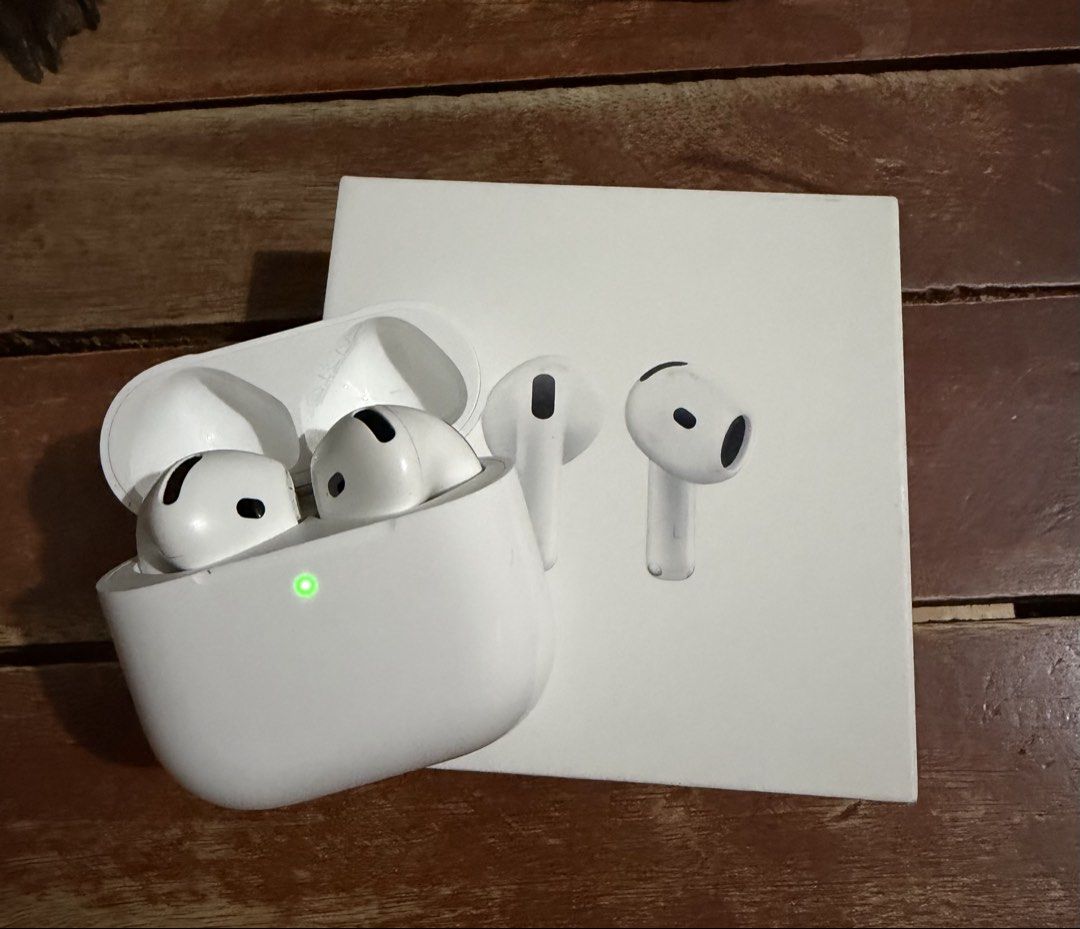 Apple AirPods 4 with Charging Case (Category: Earphones) located in Cavite. Submitted by thineramos (Listing ID 1468840426, Image 2). Description: - Model: Apple AirPods 4 (MXP63ZA/A) - Color: White - Condition: Gently used and in very good condition, extremely clean. - Battery: Holds a great charge - Inclusions: Charging case and original retail box - Perfect for an upgrade! RFS: Upgrade to Airpods5.