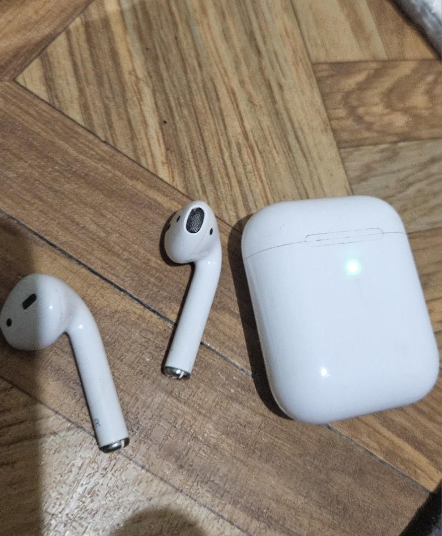 Apple AirPods with charging case and Nike case (Category: Earphones) located in Quezon City. Submitted by kizuke (Listing ID 1468904025, Image 1). Description: - Authentic Apple AirPods with charging case - Fully tested and working great - Includes a clear protective case with custom Nike graphic - Normal scuffs and wear from daily pocket carry - Battery still holds a decent charge - Thoroughly cleaned and sanitized - Ready for the next owner - g