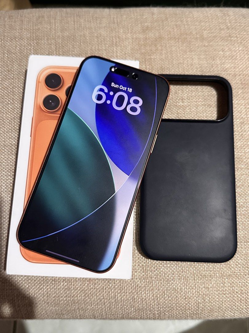 Apple iPhone 17 Pro Max Orange with Case and Box (Category: iPhone 17 Series) located in Manila. Submitted by jbuckets (Listing ID 1468853427, Image 2). Description: Upgrading phone soon, so passing this one on. ⭐️Iphone 17 Pro Max Factory Unlocked (NO ISSUE)⭐️ Color: Cosmic Orange Storage: 256gb Bought in PowerMac (SM Southmall) Battery Health: 97% Used for 1 year. No issue / history of repair. Inclusions: 🍭Original box 🍭Unused cord 🍭Original