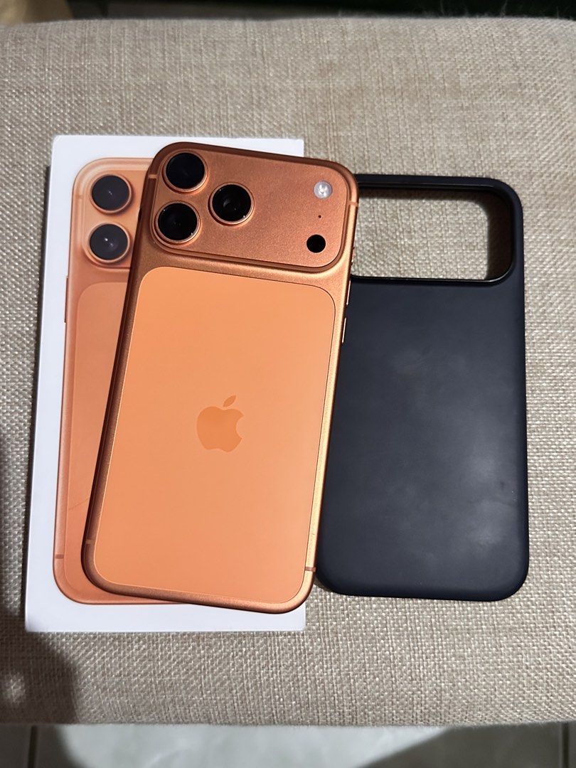 Apple iPhone 17 Pro Max Orange with Case and Box (Category: iPhone 17 Series) located in Manila. Submitted by jbuckets (Listing ID 1468853427, Image 1). Description: Upgrading phone soon, so passing this one on. ⭐️Iphone 17 Pro Max Factory Unlocked (NO ISSUE)⭐️ Color: Cosmic Orange Storage: 256gb Bought in PowerMac (SM Southmall) Battery Health: 97% Used for 1 year. No issue / history of repair. Inclusions: 🍭Original box 🍭Unused cord 🍭Original