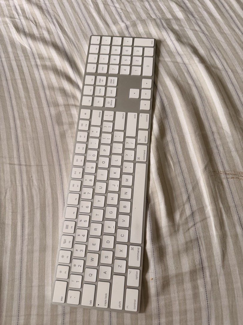 Apple Magic Keyboard with Numeric Keypad (Category: Computer Keyboard) located in Makati City. Submitted by rain3dr0ps (Listing ID 1468731883, Image 1). Description: For sale Apple wireless keyboard Ships from makati Flaw: see picture (edge) Unit is working fine except for physical flaw Payment via BPI or Gcash Buyer will shoulder shipping.