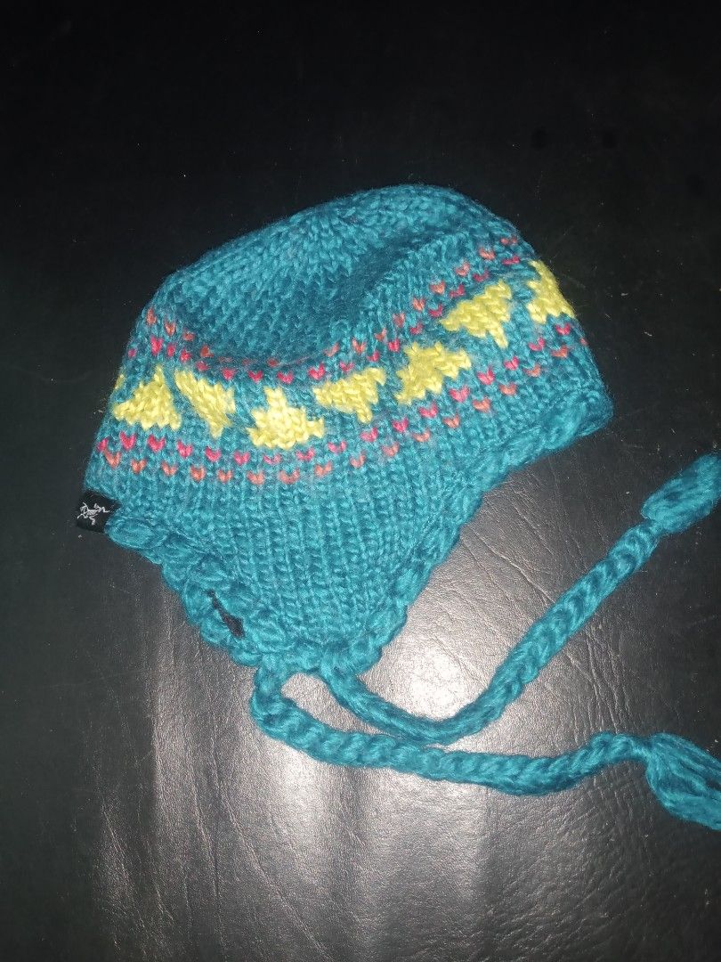 Arc'teryx Contrail Toque Ear flap beanie (Category: Hiking & Camping) located in Dasmarinas. Submitted by francoprancisco (Listing ID 1468853351, Image 1). Description: Arc'teryx Contrail Toque Ear flap beanie One size fits all Legit. excellent no flaws. 780 plus sfee.