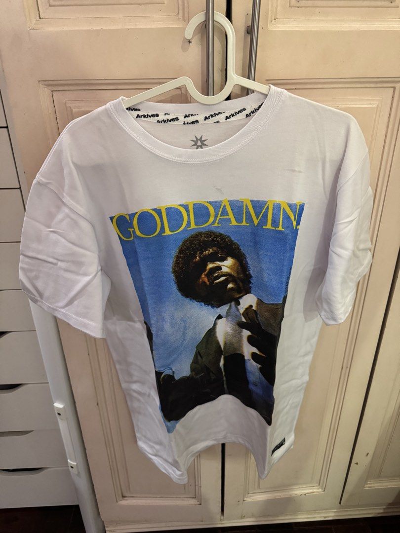 Arkives Pulp Fiction Goddamn T-shirt (Category: Tshirts & Polo Shirts ) located in Manila. Submitted by harleyy1230 (Listing ID 1468900445, Image 1). Description: Has a faint smudge mark on the chest but can be removed by washing.
