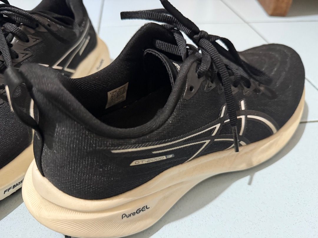 Asics GT-2000 Running Shoes Black (Category: Sneakers) located in Makati City. Submitted by elena.xxx (Listing ID 1468872281, Image 3). Description: Bought in Japan, Jan2025 Used for walks only. Probably used less than 10x only. - No box - 26cm on tag but fits my 25cm feet, probably because of its narrow design - Brand: Asics - Model: GT-2000 - Color: Black - Condition: Minor wear on the soles - Upper: Breathable mesh to keep feet cool - Sole: Cu