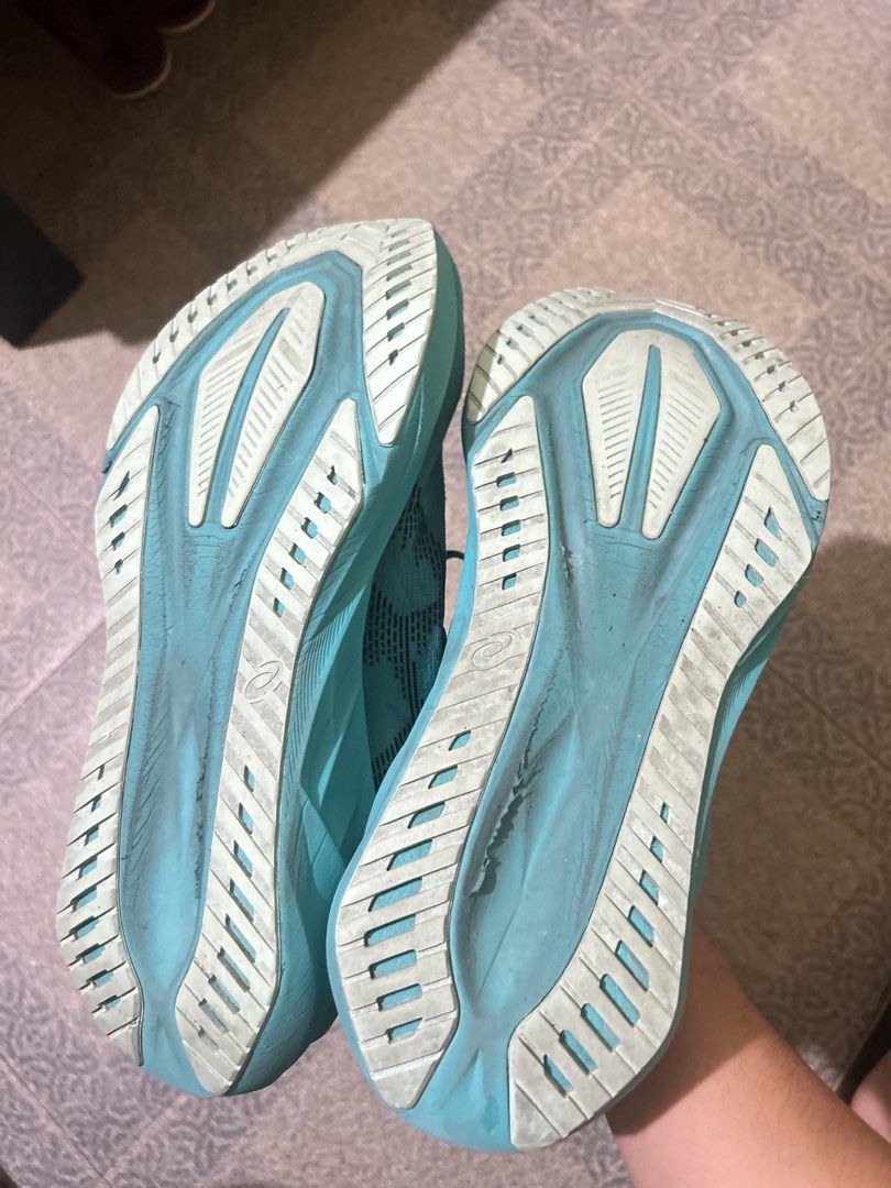 Asics Novablast 5 Wave Teal/Black (Category: Sneakers) located in Imus. Submitted by mikeythrifts (Listing ID 1468842417, Image 3). Description: - Brand: Asics Novablast 5 - Colorway: Wave Teal / Black - Style Code: 1011B974-401 - Size: Men's US 11.5 / EUR 46 / UK 10.5 / CM 29.0 - Condition: Lightly used - Inclusion: Original box and packaging included - Features: Maximum cushioning, lightweight build, and energetic bounce - Best for: Daily train