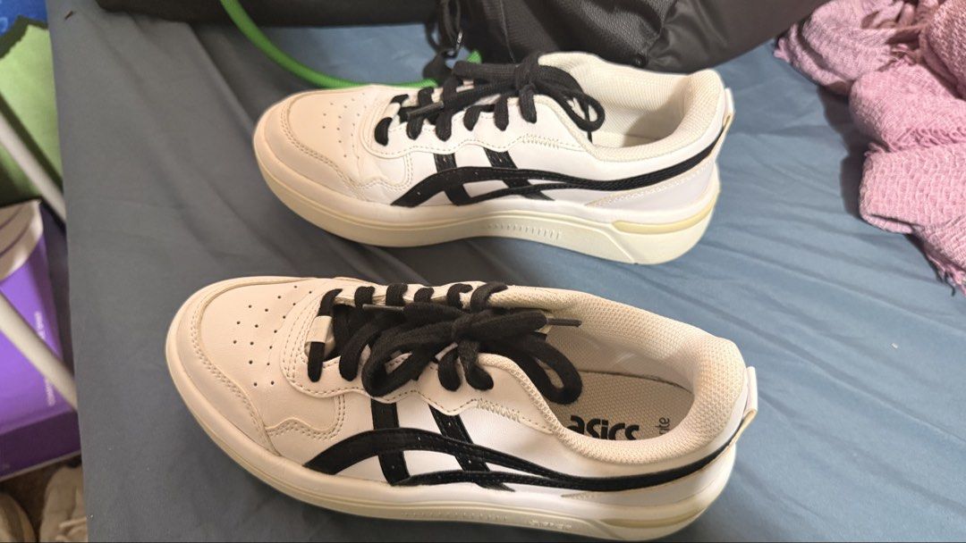 ASICS White and Black Sneakers (Category: Sneakers) located in Cainta. Submitted by frtzjy_ (Listing ID 1468765254, Image 3). Description: - Brand: ASICS - Color: White with black laces and side stripes - Insole: Ortholite for extra comfort - Condition: Brand new, still sealed in original plastic wrapping - Uppers: Clean leather with no scuffs - Best for: Solid everyday casual wear.