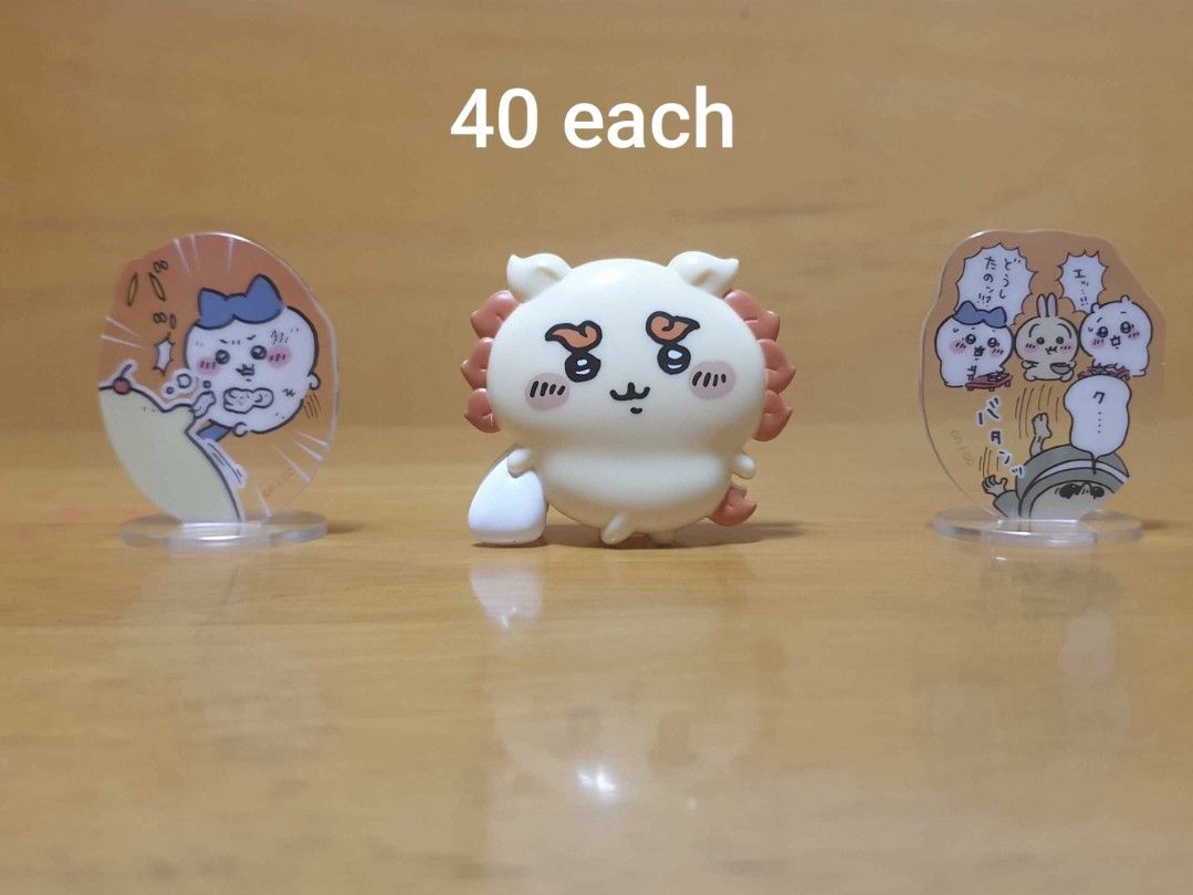 Assorted Chiikawa Merch (Category: Designer & Blind Box Toys) located in Mabalacat. Submitted by xeedoxee (Listing ID 1468929414, Image 2). Description: Chiikawa Merchandise Sale - Assorted items: Wooden Christmas tree display set (with box), puffy sticker sheet, acrylic stands, keychain charms, and miniature figurines - Individual item prices: ₱40 to ₱300 - Perfect for collectors wanting a mix of characters and merch types - Available for indivi
