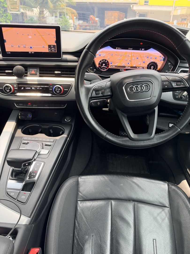 Audi A4 SEDAN 2.0 TFSI S TRONIC (NAV) Auto (Category: Used Cars) located in Singapore. Submitted by mannhkm (Listing ID 1468748710, Image 3). Description: 2018 Audi A4 B9 2.0 TFSI S tronic (NAV) * White interior and exterior with 18” rims and December 2025 Michelin PS5 tyres * High mileage but well maintained * Preventive maintenance done with receipts available * Navigation & Apple or Android CarPlay Well-maintained continental sedan with mainte