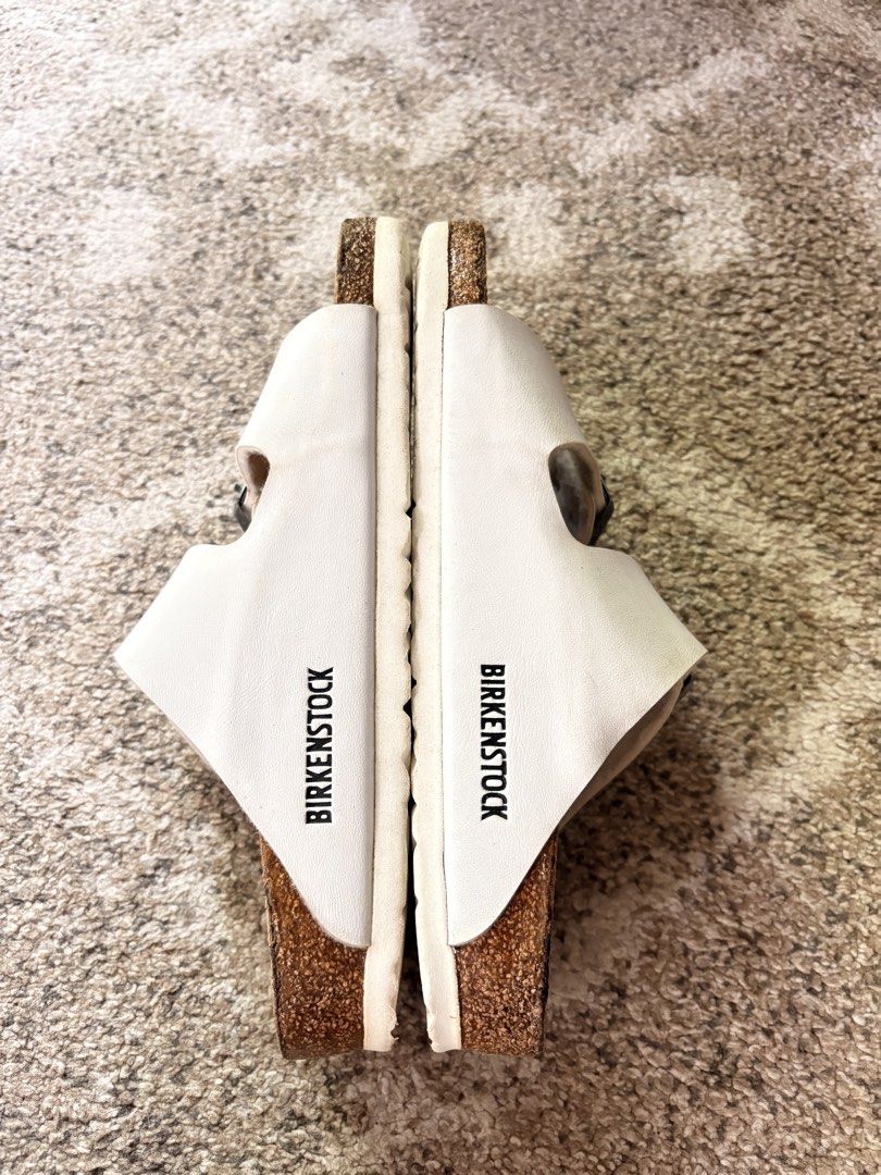 Auth Preloved Birkenstock Arizona (Category: Slippers and slides) located in Paranaque City. Submitted by silentstone.dolphin (Listing ID 1468768797, Image 3). Description: Color White.. Brass Buckle.. Visible Print.. Size 37N.. Clean&Ready to Wear..✅ Best Seller Colorway!🥳 Super Nice in Actual😍.