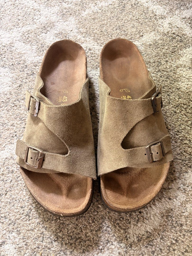 Auth Preloved Zurich Birkenstock (Category: Slippers & Slides) located in Paranaque City. Submitted by silentstone.dolphin (Listing ID 1468926047, Image 1). Description: Suede Leather.. Taupe Color.. Visible Print.. Brass Buckle.. Clean&Ready to Wear✅ Super Nice in Actual😍.