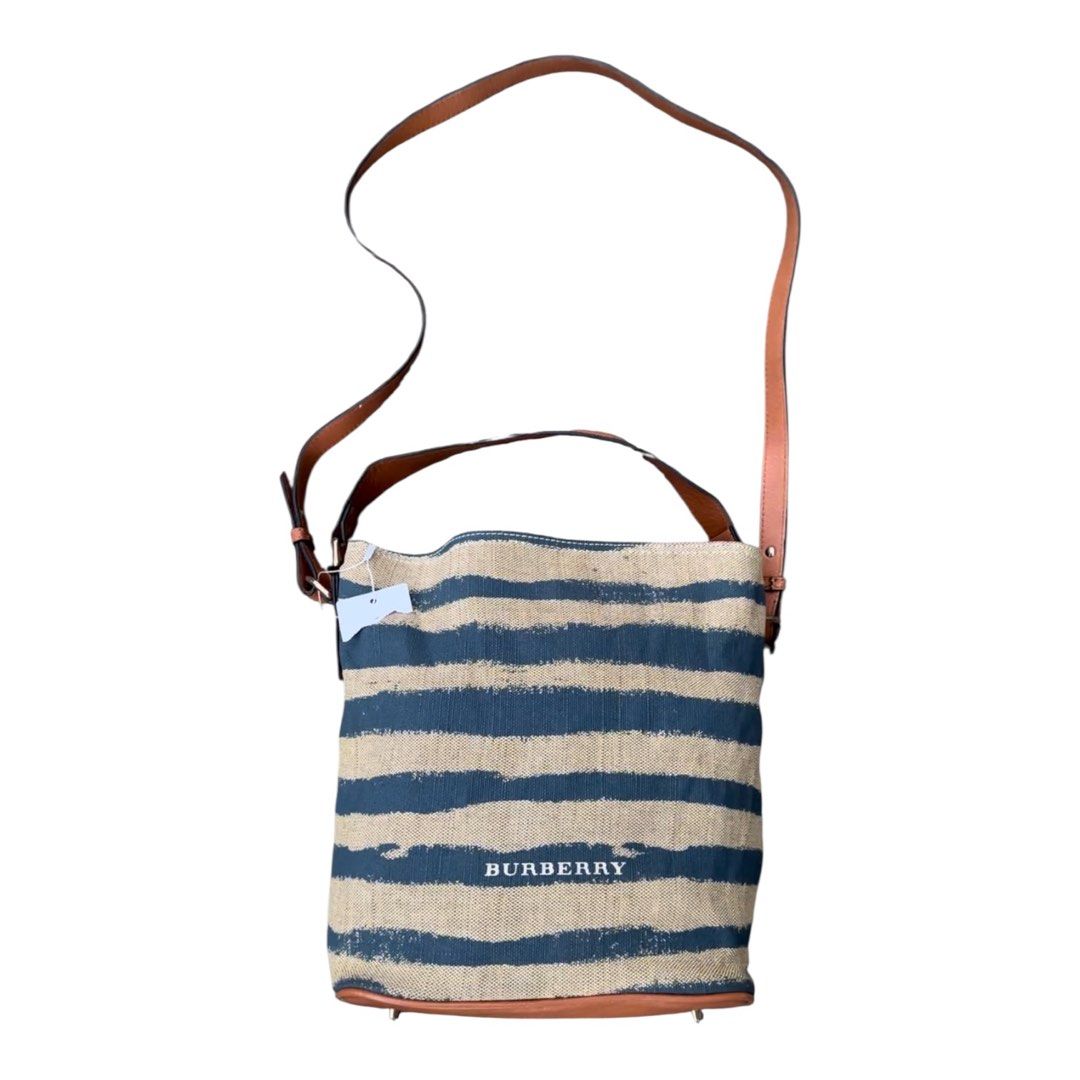 Authentic BURBERRY (Category: Cross-body Bags) located in San Fabian. Submitted by rei_aniels (Listing ID 1468756914, Image 2). Description: Authentic BURBERRY Bucket Bag Like new Coded Striped Canvas Leather Medium size .