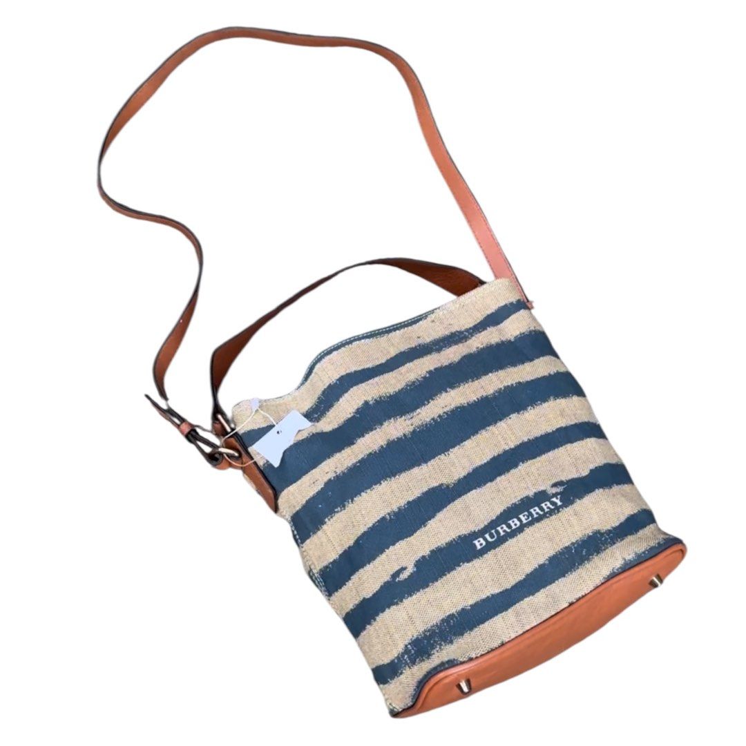 Authentic BURBERRY (Category: Cross-body Bags) located in San Fabian. Submitted by rei_aniels (Listing ID 1468756914, Image 3). Description: Authentic BURBERRY Bucket Bag Like new Coded Striped Canvas Leather Medium size .