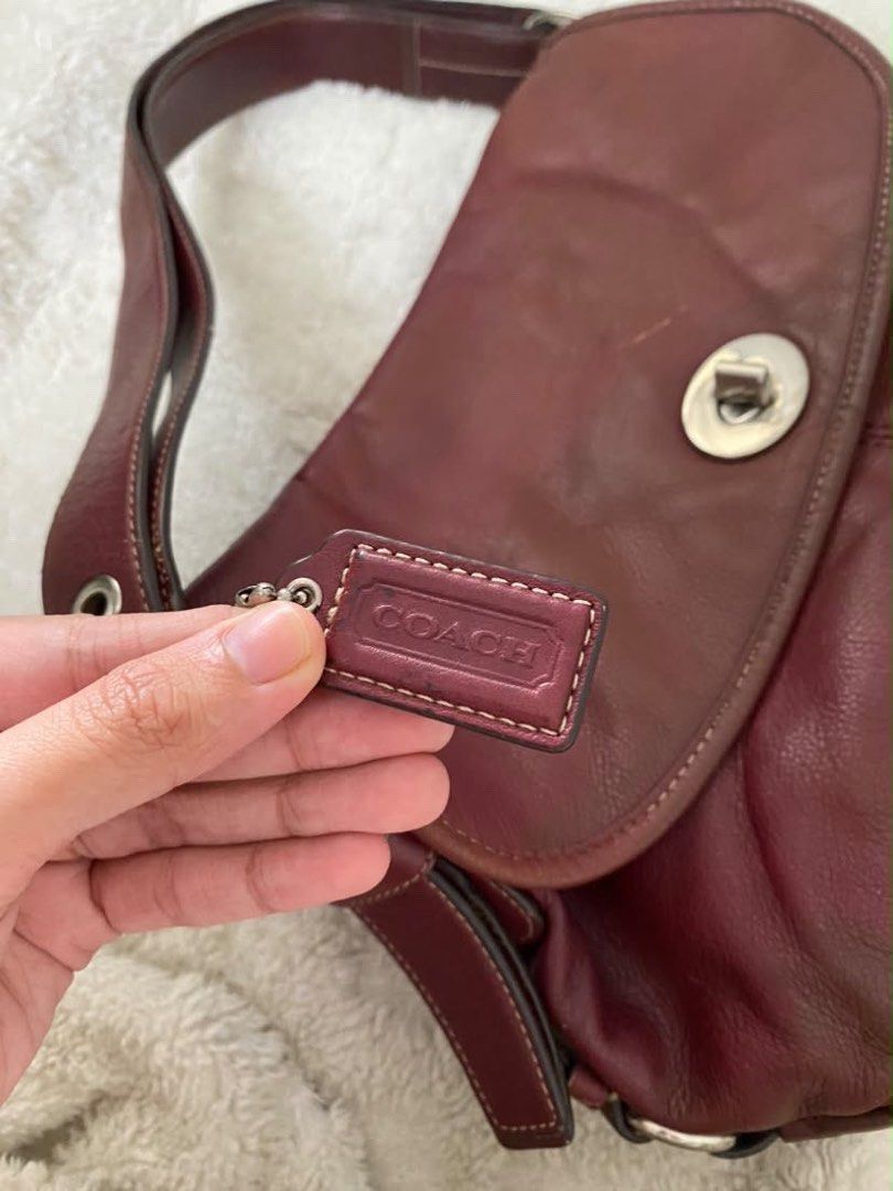 AUTHENTIC Coach Burgundy Leather Shoulder Bag with Turnlock Closure (Category: Luxury Bags & Wallets) located in Mexico. Submitted by alexacarts (Listing ID 1468851887, Image 2). Description: - no more photos *please manage your expectations as these are preloved* *no return / exchange* LOC: Pampanga Payment: Gcash / Any mode of bank transfer Courier: J&T.