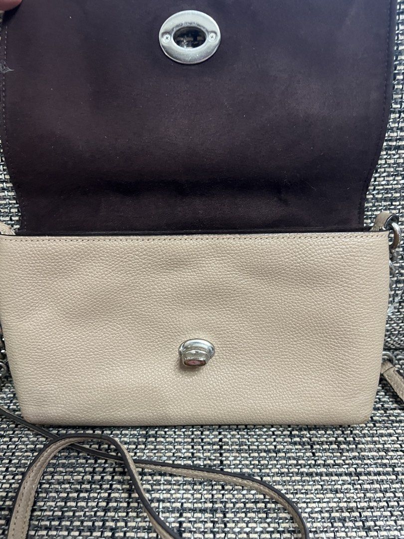 Authentic Coach Cross Body Bag (Category: Luxury Bags & Wallets) located in Cainta. Submitted by vrenaussiegoods (Listing ID 1468927228, Image 2). Description: This Authentic Coach bag is well used condition, but please note there is an issue on the strap anchor of the handle (see photos for details). Still usable .