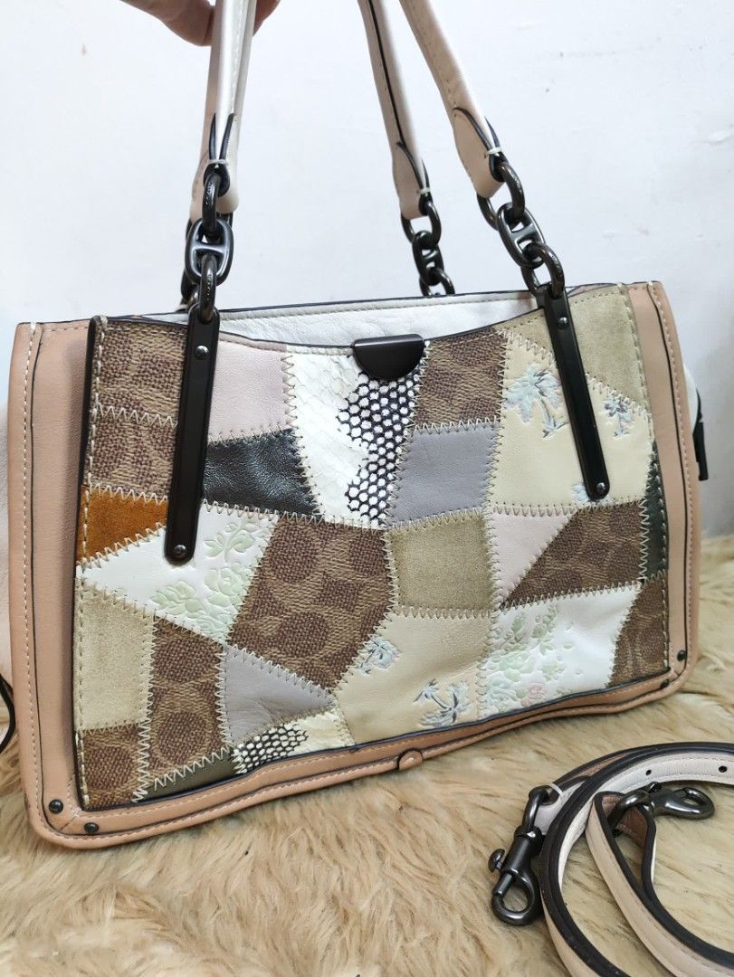 Authentic Coach Dreamer 27 patchwork 2 way (Category: Cross-body Bags) located in Rizal. Submitted by hsiri1128 (Listing ID 1468805185, Image 2). Description: 💯✔️Legit CONDITION : 8.5/10 ISSUE / FLAWS : like new sana to nag peel off lang loob matagal na stock sa box during shipment. MATERIAL : Genuine satchel leather exterior w/ gunmetal hardwares DETAILS : Medium size fit small umbrella and notebook. adjustable strap..