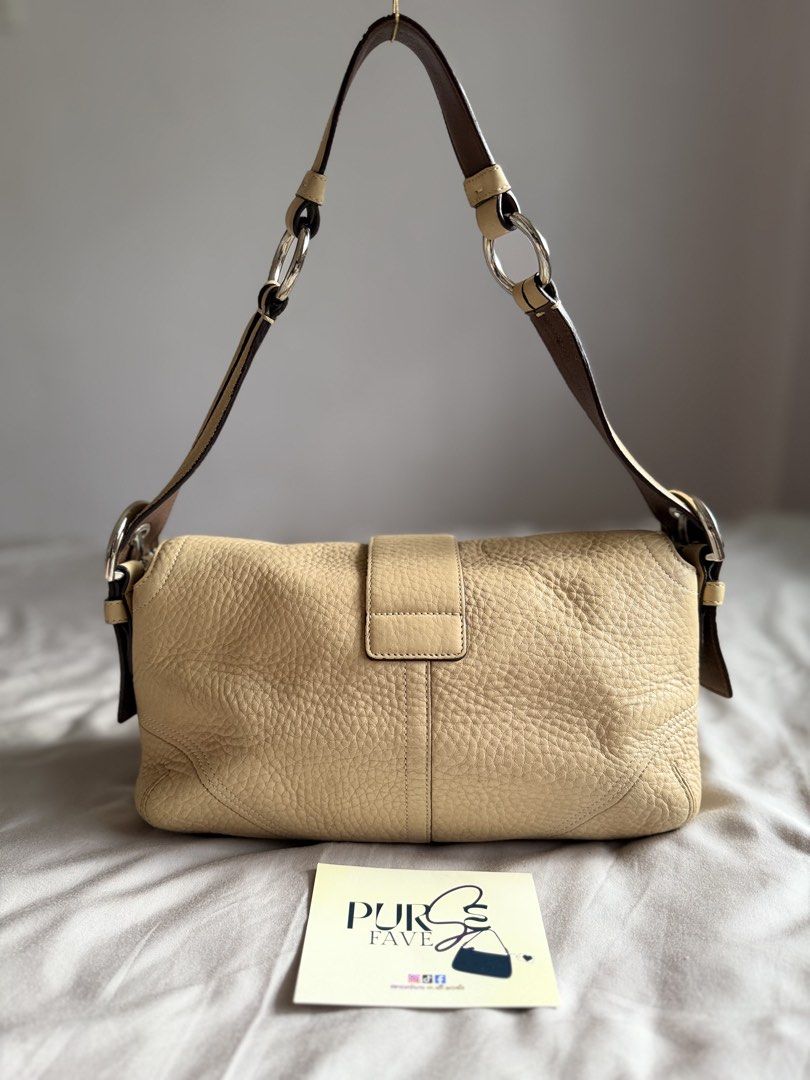 Authentic Coach Soho Pebbled Double Pocket Shoulder Bag (Category: Shoulder Bags) located in Cebu City. Submitted by pursefaves (Listing ID 1468922811, Image 2). Description: Please read ALL the details below for full info of the item :) 💯Authentic, can ship ASAP & worldwide ✅Accepts decent offers ❎Low ballers ignored Authentic Coach Soho Pebbled Double Pocket Shoulder Bag Rank AB+ (Very Good Condition) Full Details Exterior Material: Ivory pebb