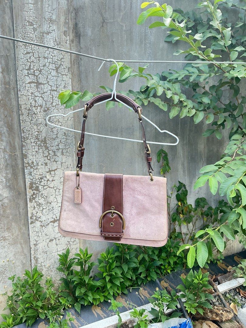 Authentic Coach Soho Suede Flap in Purple (Category: Luxury Bags & Wallets) located in Caloocan City. Submitted by aesthetix. (Listing ID 1468722567, Image 1). Description: Handles, Buckles, and Interior are in prestine condition. Suede needs cleaning has a stain see pics.