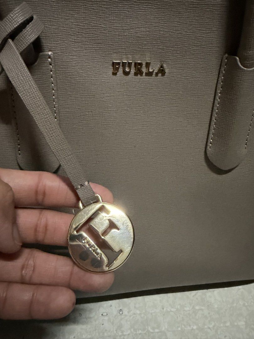 Authentic FURLA shoulder bag (Category: Shoulder Bags) located in Pateros City. Submitted by celle0619 (Listing ID 1468824407, Image 2). Description: Guaranteed Authentic with Loads of compartments .