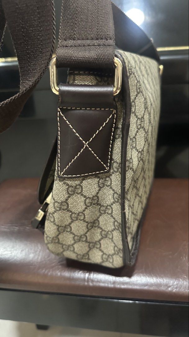 Authentic Gucci Messenger Bag (Category: Luxury Bags & Wallets) located in Las Pinas. Submitted by marshmallowmax (Listing ID 1468813045, Image 3). Description: Guaranteed Authetic! Slightly used but with minor flaws on trim-cracks, refer last photo, hence selling low No more inclusions.
