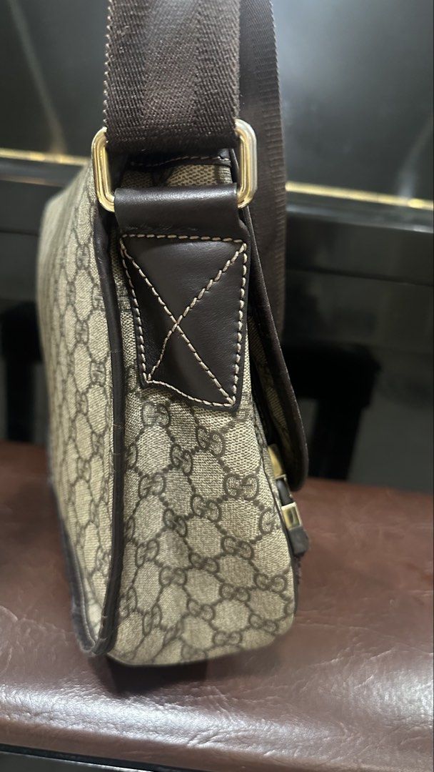 Authentic Gucci Messenger Bag (Category: Luxury Bags & Wallets) located in Las Pinas. Submitted by marshmallowmax (Listing ID 1468813045, Image 2). Description: Guaranteed Authetic! Slightly used but with minor flaws on trim-cracks, refer last photo, hence selling low No more inclusions.