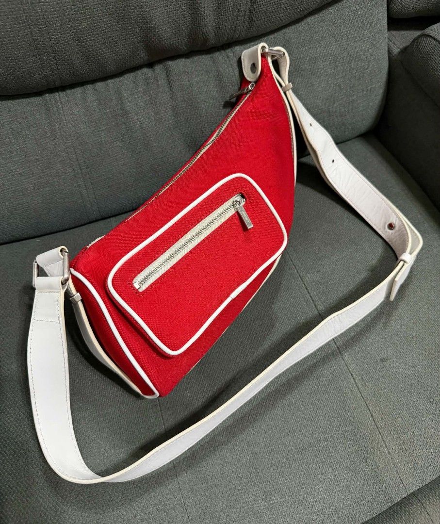Authentic Lacoste Crossbody (Category: Cross-body Bags) located in Quezon City. Submitted by luxxechic (Listing ID 1468750514, Image 2). Description: with etiketa canvas and leather material adjustable strap looks new no issue actual photo posted mop; gcash.