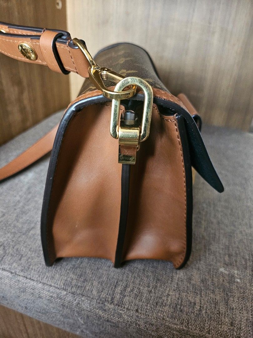 Authentic Louis Vuitton Dauphine Mini Size (Category: Luxury Bags & Wallets) located in Antipolo. Submitted by frostymmer (Listing ID 1468826228, Image 3). Description: Authentic Louis Vuitton Dauphine Mini Size With dustbag In good condition with minor signs of usage.