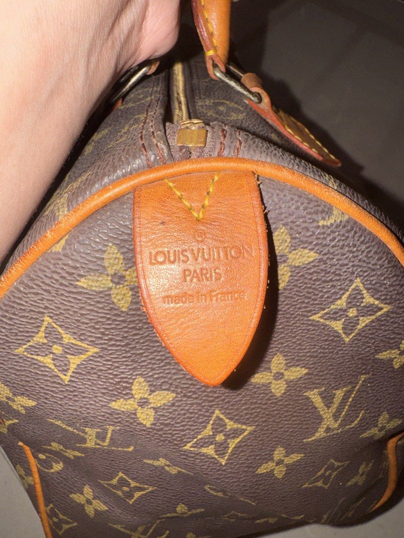 Authentic Louis Vuitton Monogram Speedy Handbag (Category: Luxury Bags & Wallets) located in Cebu City. Submitted by latendacebu (Listing ID 1468773553, Image 2). Description: - Classic monogram canvas pattern with premium brown leather trim - Elegant golden hardware and included side padlock - Iconic top handle style with secure top zipper closure - Traditional doctor bag silhouette offering a spacious interior - Authentic 'Made in France' stamp