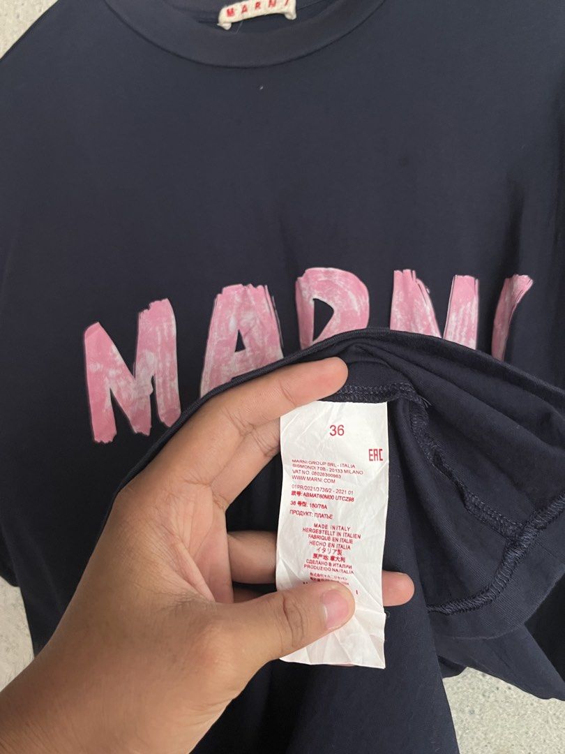 Authentic Marni Script Shirt (Category: Luxury Apparel) located in Adams. Submitted by princess.maggie (Listing ID 1468750892, Image 2). Description: - 36 on tag - 19.5-20 x 27.5 - authentic - as new.