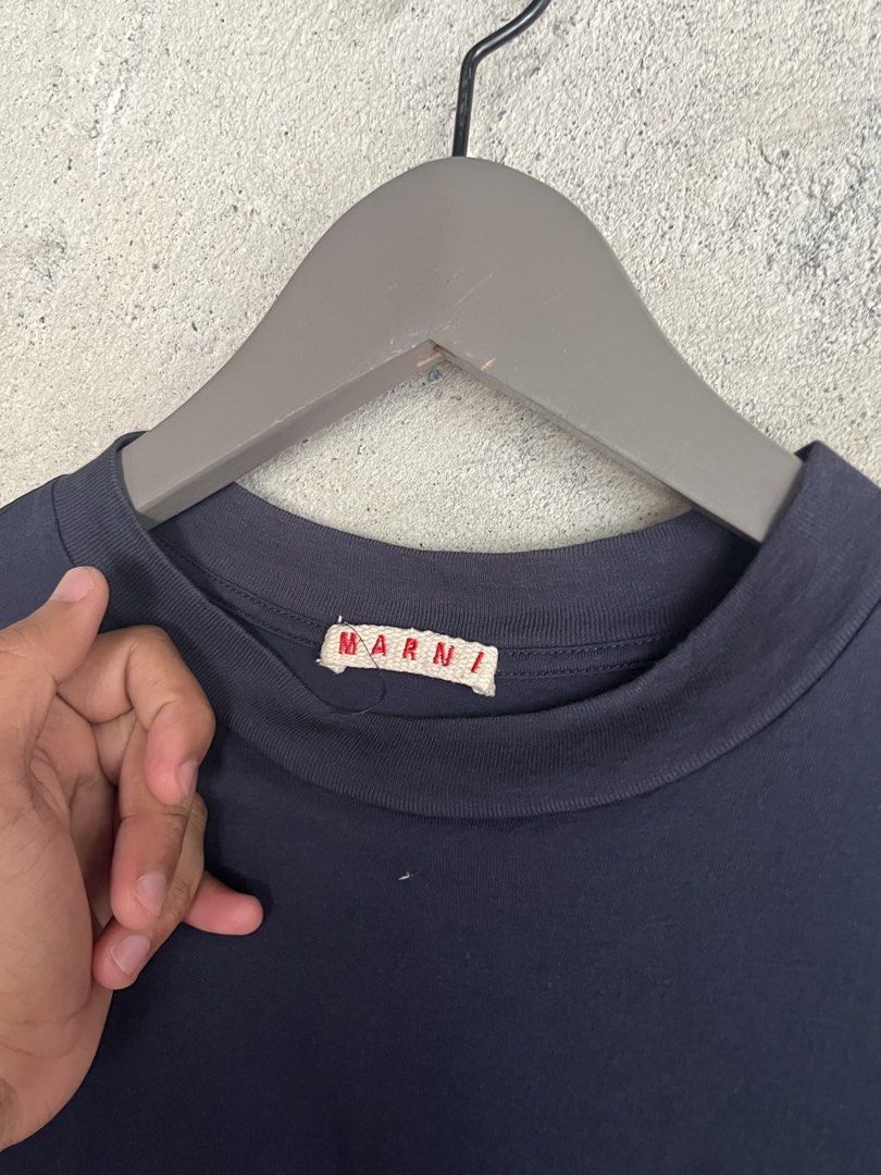 Authentic Marni Script Shirt (Category: Luxury Apparel) located in Adams. Submitted by princess.maggie (Listing ID 1468750892, Image 3). Description: - 36 on tag - 19.5-20 x 27.5 - authentic - as new.