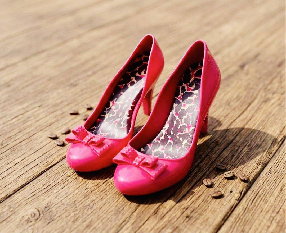 Authentic Melissa (Category: Heels) located in Baliuag. Submitted by sirc_28 (Listing ID 1468803147, Image 1). Description: Mel by Melissa “Rasberry II” pink jelly pumps. This playful style features a signature bubblegum-scented Melflex plastic construction, a textured pyramid-studded bow detail on the toe box, and a distinctive leopard print cushioned insole. .