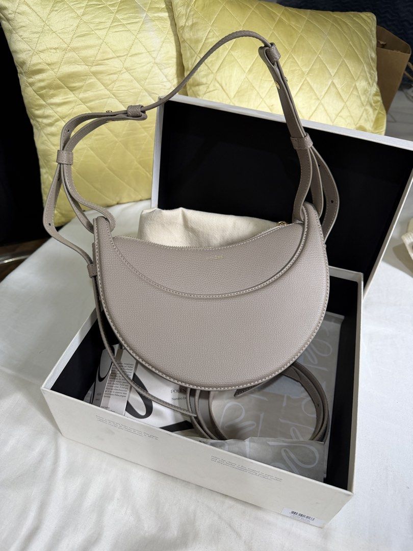 Authentic Polène Numéro Dix in Taupe (Category: Luxury Bags & Wallets) located in Pasig City. Submitted by michyyy_mvm (Listing ID 1468741856, Image 1). Description: Polène Numéro Dix in Taupe - Inclusions: 2 straps, dust bag box, tags and box. - Condition: Bag and hardware itself is in Excellent/Pristine condition but box is not (see photo) - bought in Paris (January 2025) can show proof - long strap never used - RFS: want to but another polene 