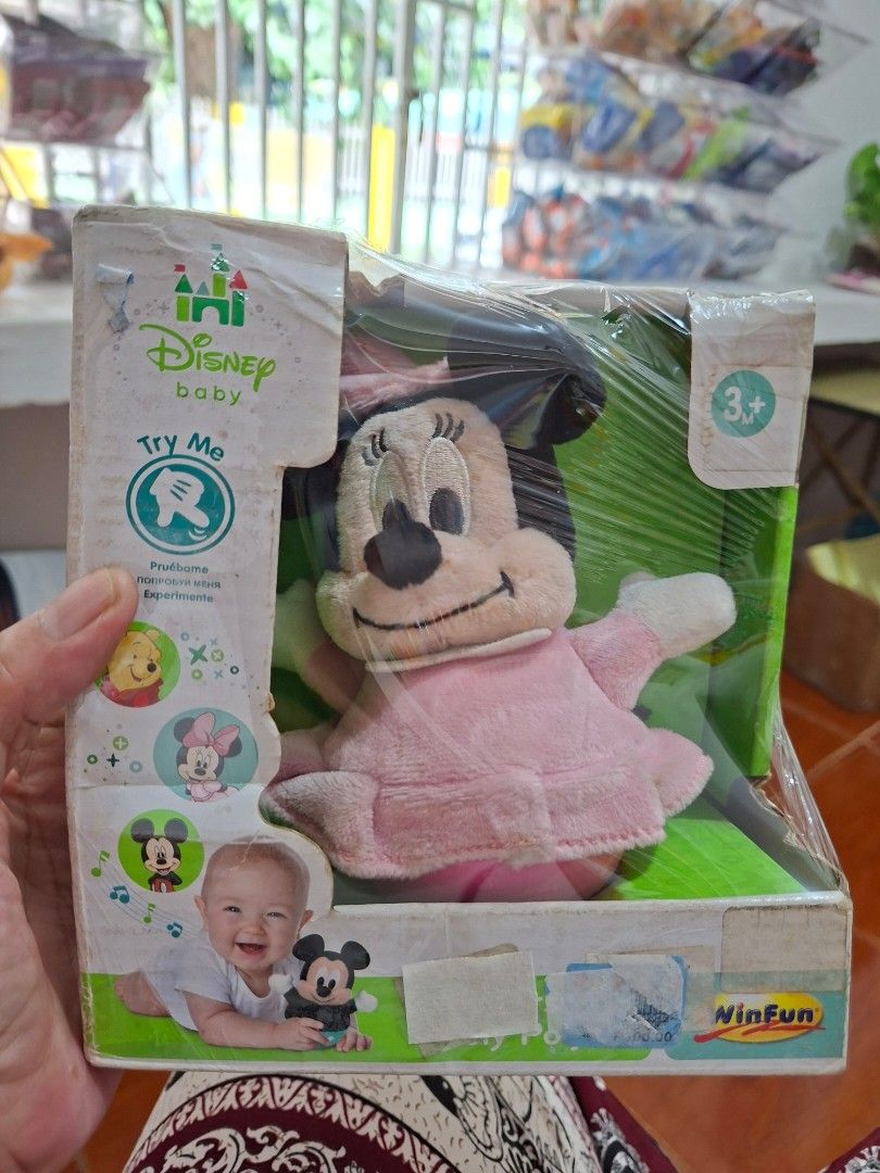 Baby Disney Minnie Mouse interactive plush toy (Category: Interactive Toys) located in Manila. Submitted by happywindmarlyn (Listing ID 1468778621, Image 1). Description: - Baby Disney Minnie Mouse interactive plush toy - Brand/Maker: Produced under the Disney Baby line in collaboration with toy manufacturers such as Clementoni . - Interactive Sound & Music. : It plays gentle, comforting musical tunes, nursery rhymes, and cute sound effects tailo