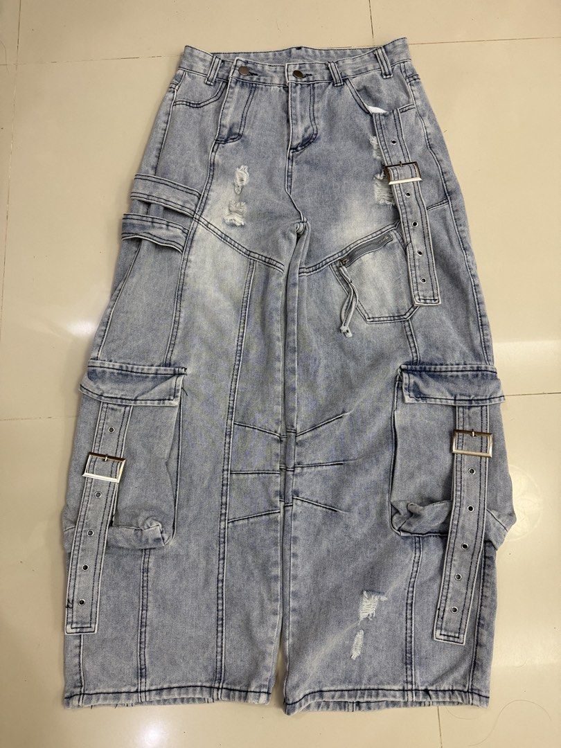 Baggy Cargo Denim Jeans (Category: Jeans) located in Lipa City. Submitted by cokelight11 (Listing ID 1468821163, Image 2). Description: Baggy Cargo Denim Pants Size 28-29 Light wash denim cargo pants with multiple utility pockets, buckle straps, and distressed details. Super baggy fit down the leg. Heavyweight denim with contrast stitching. Great streetwear piece..