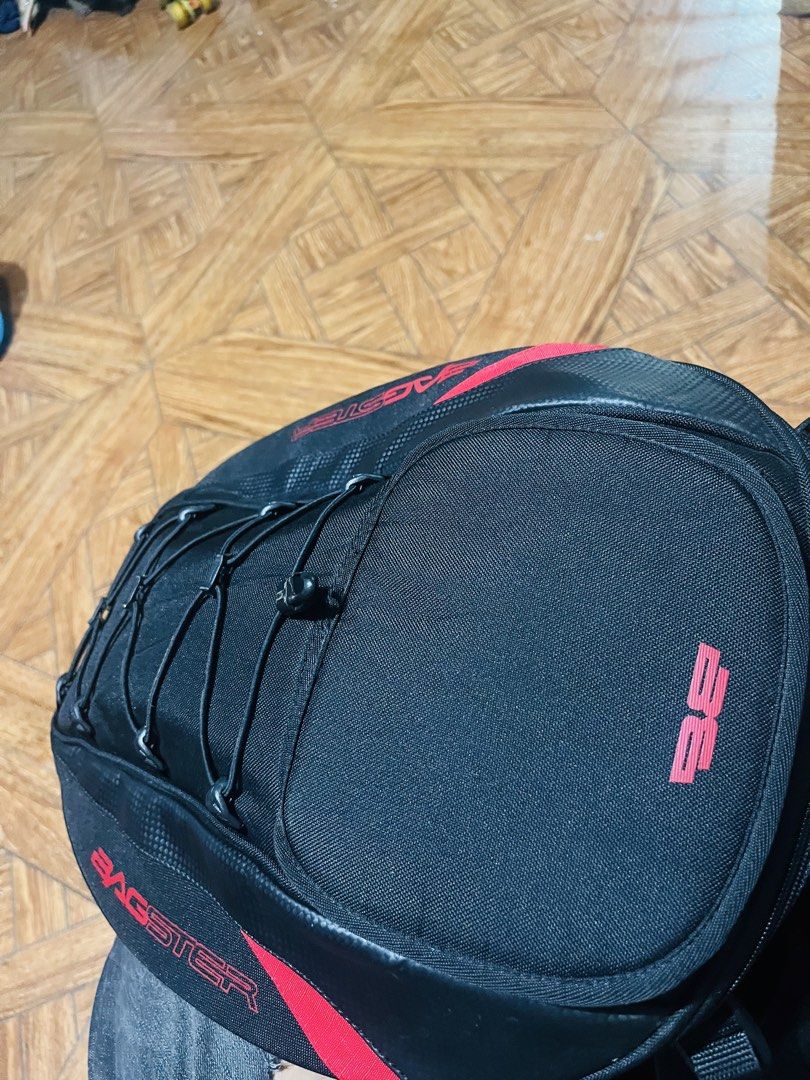 Bagster Spider Motorcycle Tail Bag Luggage (Category: Backpacks) located in Manila. Submitted by athan0800 (Listing ID 1468848791, Image 2). Description: - Brand new with tag attached - Color: Black with red accents - Fits easily on scooter or motorcycle seats - Includes rain cover, mounting straps, and backpack harness - Top bungee cords for extra gear storage - Ideal for daily commuting and long rides.