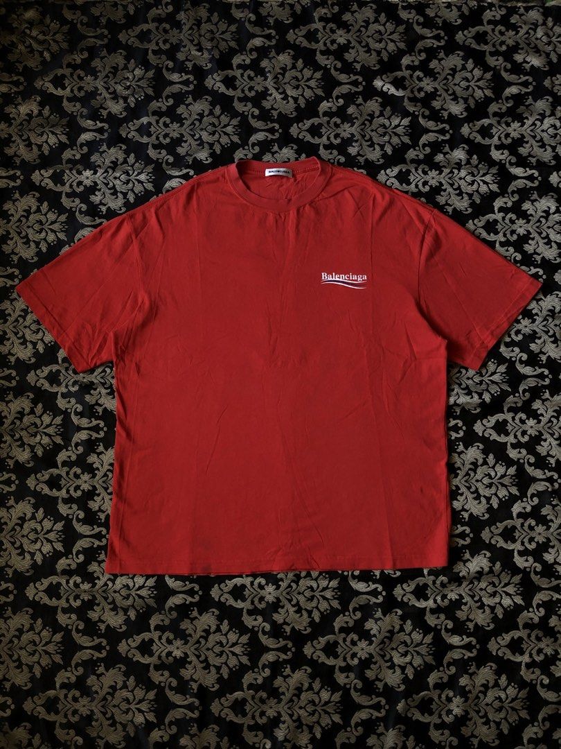 Balenciaga “campaign” Tshirt red (Category: Tshirts & Polo Shirts ) located in Dipolog. Submitted by sellgoodsitem_2k23 (Listing ID 1468774939, Image 1). Description: Size:large Dimes:24.5x29.5 Issue:black stain ata yan washable Colorrate:9.5/10 Goodcondition .