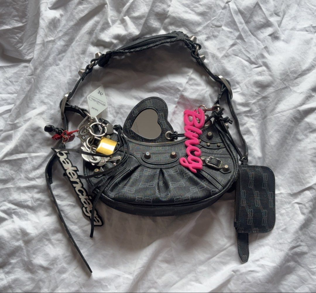 Balenciaga Le Cagole BB monogram (Category: Luxury Bags & Wallets) located in Las Pinas. Submitted by confessionsofashoppaholix (Listing ID 1468751234, Image 3). Description: Balenciaga Le cagole BB Monogram no issue coded charms not included.