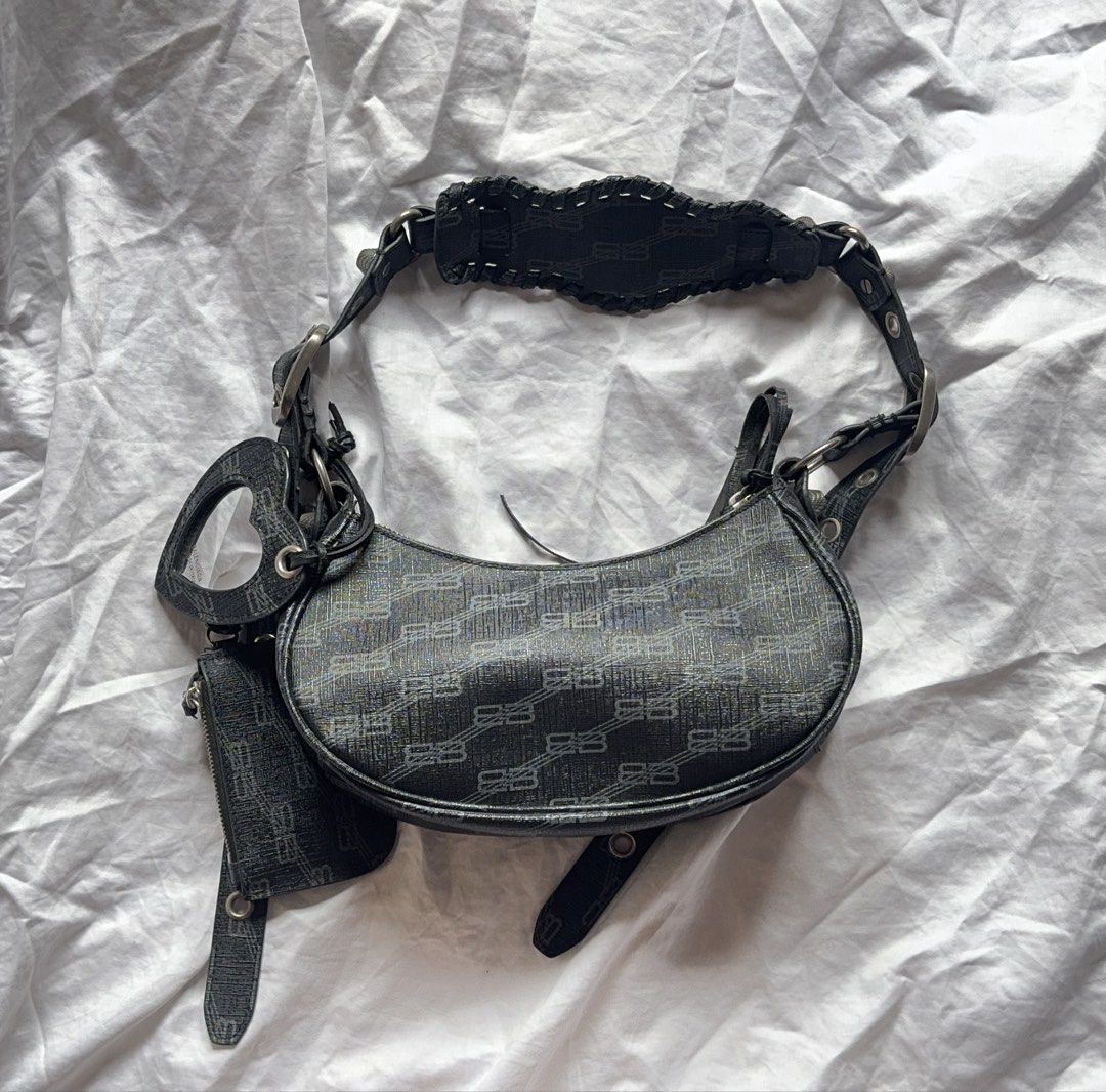 Balenciaga Le Cagole BB monogram (Category: Luxury Bags & Wallets) located in Las Pinas. Submitted by confessionsofashoppaholix (Listing ID 1468751234, Image 2). Description: Balenciaga Le cagole BB Monogram no issue coded charms not included.
