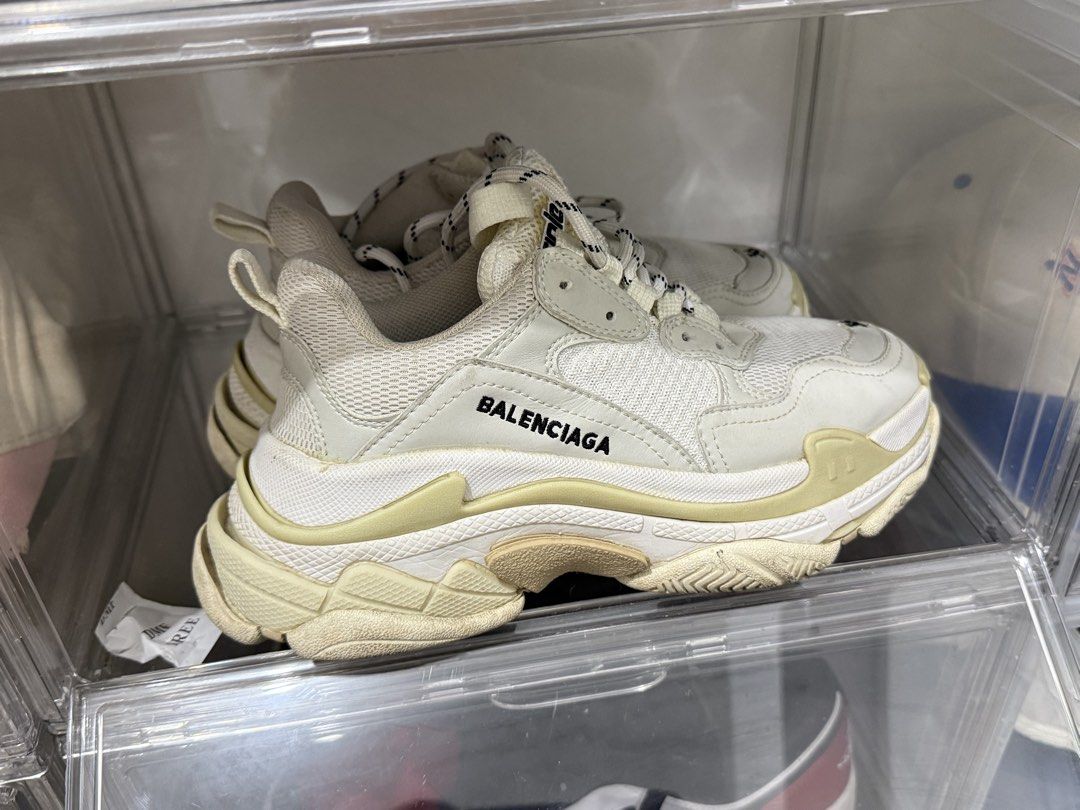 Balenciaga Triple S White (Category: Sneakers & Footwear) located in Makati City. Submitted by vvandko (Listing ID 1468879146, Image 3). Description: - Brand: Balenciaga Triple S Chunky Sneakers - Color: White with black branding - Size: 36 - Worn a few times with minimal signs of wear on soles and uppers - Authenticity not guaranteed..