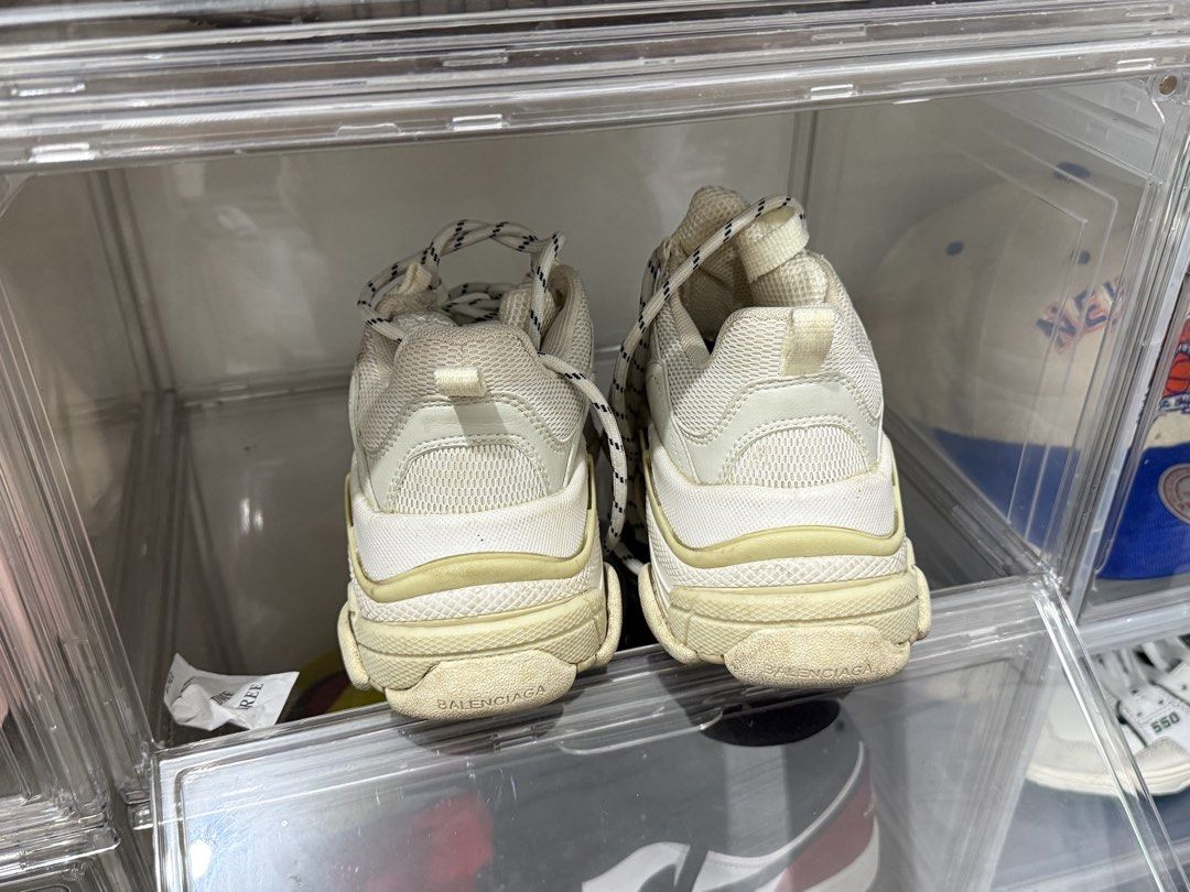 Balenciaga Triple S White (Category: Sneakers & Footwear) located in Makati City. Submitted by vvandko (Listing ID 1468879146, Image 2). Description: - Brand: Balenciaga Triple S Chunky Sneakers - Color: White with black branding - Size: 36 - Worn a few times with minimal signs of wear on soles and uppers - Authenticity not guaranteed..