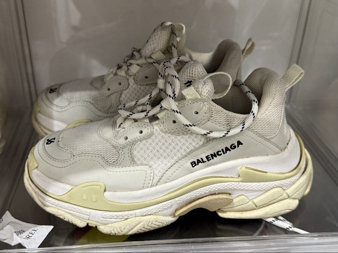 Balenciaga Triple S White (Category: Sneakers & Footwear) located in Makati City. Submitted by vvandko (Listing ID 1468879146, Image 1). Description: - Brand: Balenciaga Triple S Chunky Sneakers - Color: White with black branding - Size: 36 - Worn a few times with minimal signs of wear on soles and uppers - Authenticity not guaranteed..