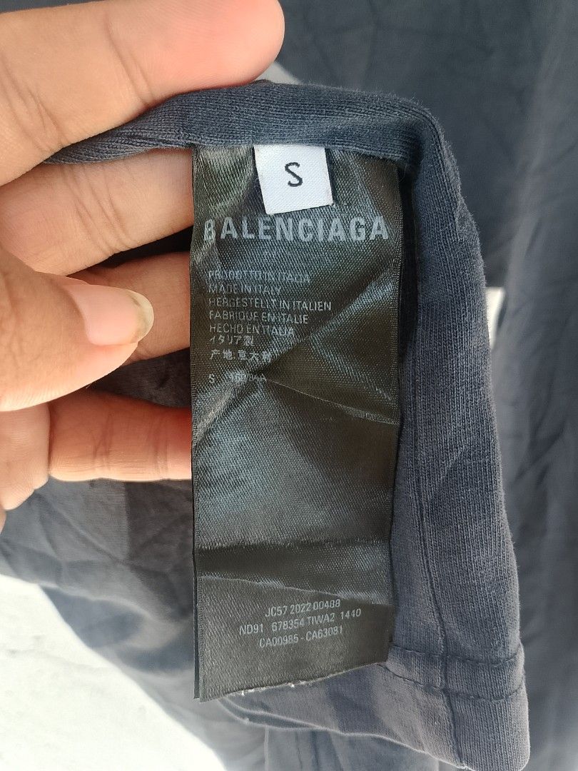 Balenciaga x Adidas Oversized T-Shirt (Category: Tshirts & Polo Shirts ) located in Surigao. Submitted by luffytrift (Listing ID 1468802491, Image 2). Description: Balenciaga x Adidas Oversized T-Shirt Size: Small Dimension: L27 x W22 Good Condition Color rate: 8.5 Issue: Minimal fading & Slight loose neck.