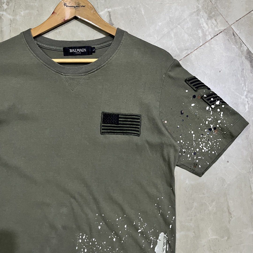 BALMAIN PAINT SPLATTER ARMY TSHIRT (Category: Luxury Apparel) located in Marikina City. Submitted by arniejane23 (Listing ID 1468882240, Image 2). Description: BALMAIN PAINT SPLATTER ARMY TSHIRT SIZE L on tag DIMENSION width - 20.5 length - 28 CUT WASHTAG NO ISSUE/NO FLAWS EXCELLENT CONDITION!! 📩📩📩.
