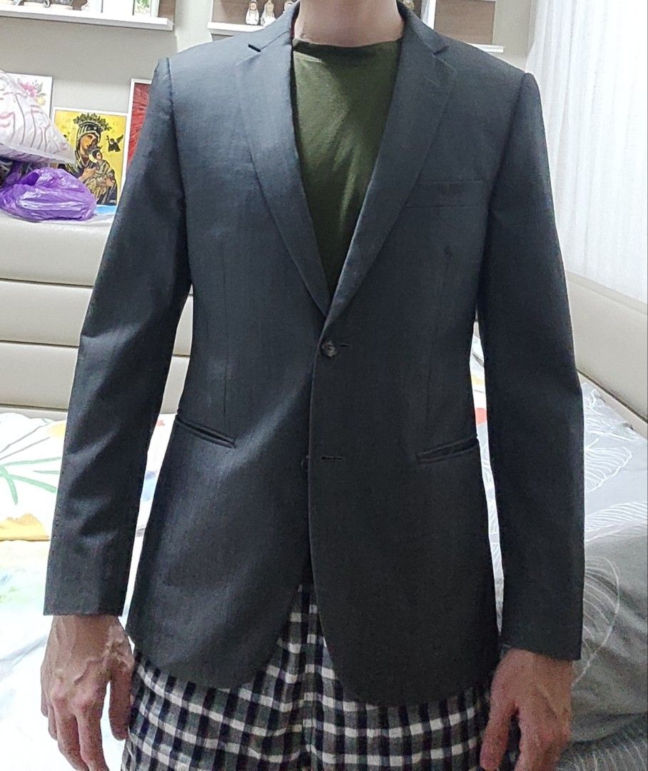Balmain Paris Suit (Category: Coats, Jackets and Outerwear) located in Quezon City. Submitted by rapstoreph (Listing ID 1468651727, Image 1). Description: - Brand: Balmain Paris - Color: Classic Dark Grey - Fit: Slim fit with structured shoulders - Details: Two-button front closure, notched lapels, clean back with center vent - Interior: Fully lined with multiple practical pockets - Condition: Excellent / Well-maintained - Perfect for: Office wea