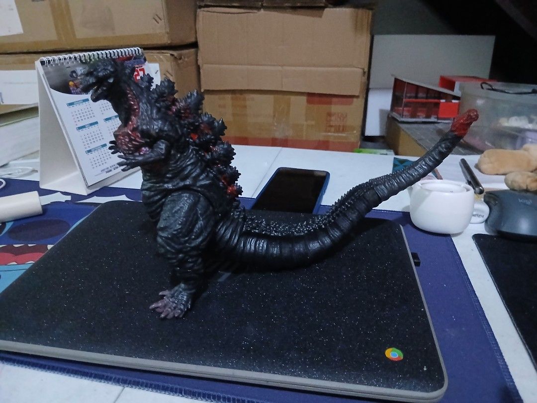 Bandai 2016 Shin Godzilla Figure (Category: Figurines & Statues) located in Caloocan City. Submitted by worthharveylee (Listing ID 1468765908, Image 1). Description: - Authentic Bandai Shin Godzilla 2016 figure - Dark textured skin with striking red highlights on chest, back spikes, and tail tip - Articulated limbs and tail for dynamic posing - Stamped on the foot bottom for authenticity - Clean and well-maintained from a private collection.